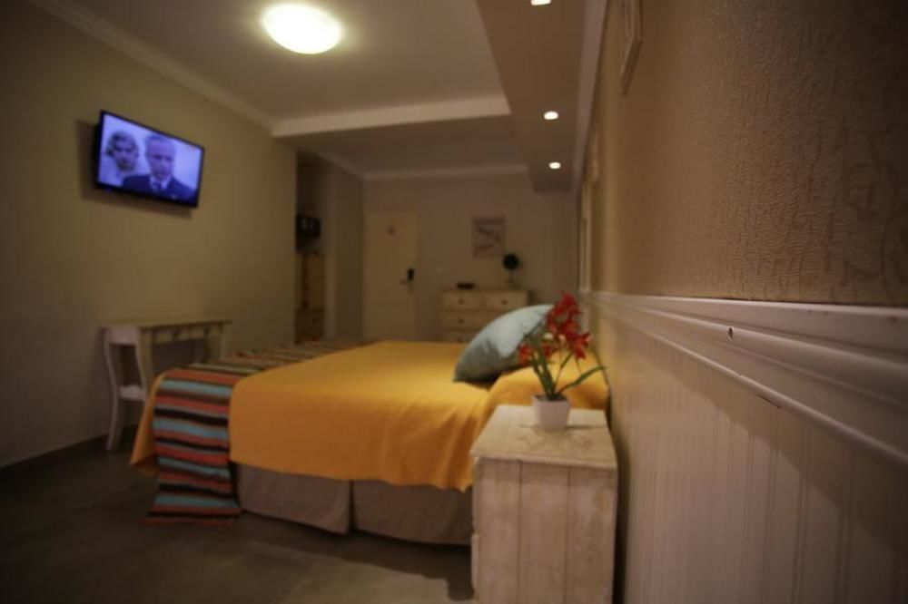 Club House Hotel Вила Карлос Пас Екстериор снимка